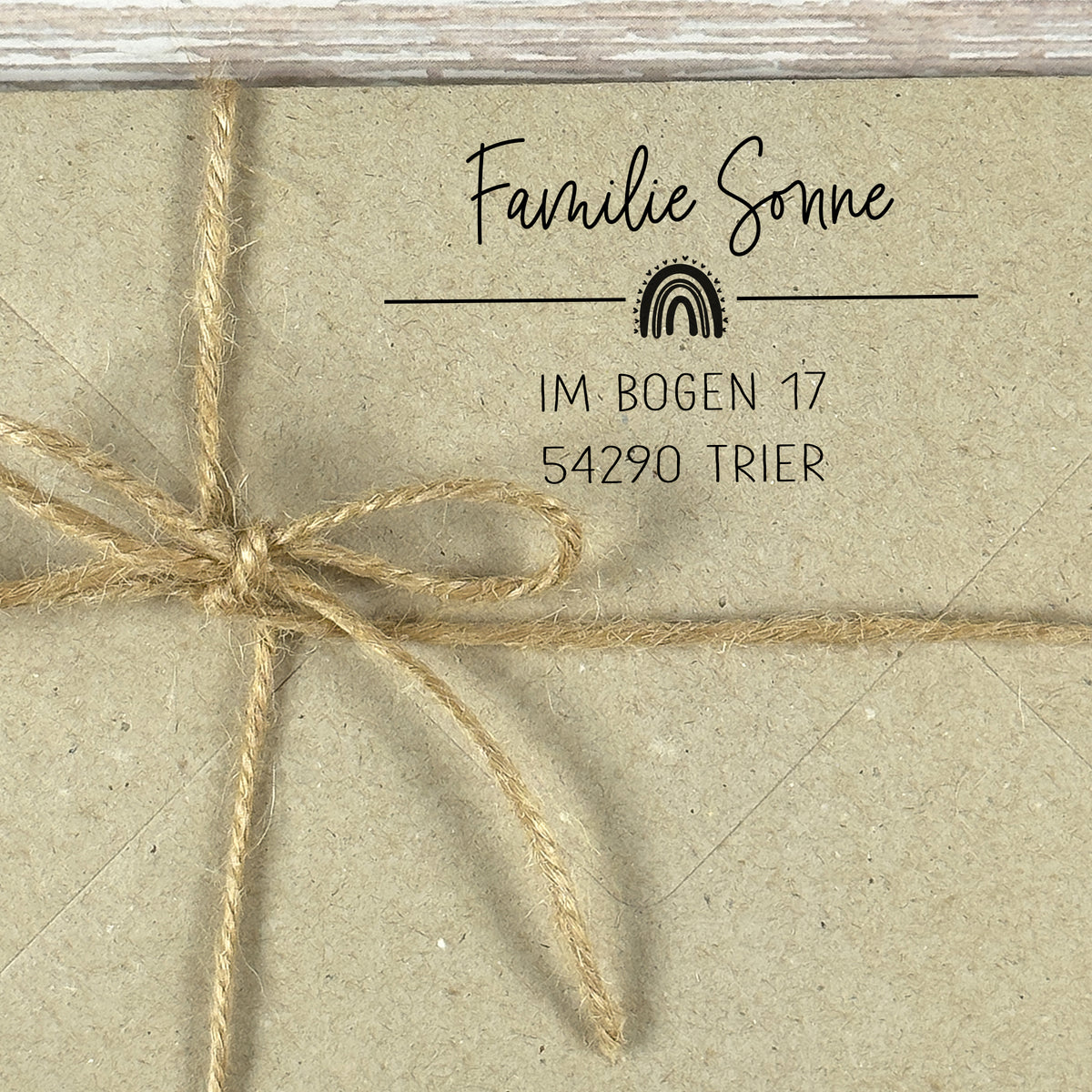 Adressstempel "Trier" mit kleinem Regenbogen